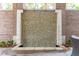 Unique water feature with natural stone and elegant design, enhancing the outdoor space at 155 Wingo Way # 421, Mount Pleasant, SC 29464