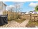 Fenced backyard with grass and a patio area, ideal for outdoor enjoyment at 1662 Hunters Run Dr, Mount Pleasant, SC 29464