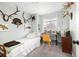 Neutral bedroom featuring a twin bed, desk, and window for natural light at 1662 Hunters Run Dr, Mount Pleasant, SC 29464