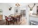 Spacious dining room featuring a window and table set for six at 1662 Hunters Run Dr, Mount Pleasant, SC 29464