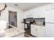 Bright kitchen with stainless steel appliances, granite counters and wooden floors at 1662 Hunters Run Dr, Mount Pleasant, SC 29464