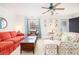 Bright living room featuring hardwood floors and comfortable seating at 1662 Hunters Run Dr, Mount Pleasant, SC 29464