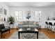 Inviting living room with hardwood floors and a stylish sofa, creating a cozy space at 167 Spring St # A/B, Charleston, SC 29403