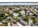 Stunning aerial view of a charming neighborhood with colorful rooftops near a waterfront at 18 Logan St, Charleston, SC 29401