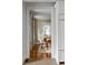 Inviting dining room featuring hardwood floors and charming floral curtains at 18 Logan St, Charleston, SC 29401