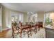 Spacious dining room with fireplace, hardwood floors, and open layout at 18 Logan St, Charleston, SC 29401