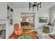 Elegant living room with hardwood floors and view into formal dining room at 18 Logan St, Charleston, SC 29401