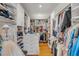 Well-organized walk-in closet with custom shelving and ample storage at 18 Logan St, Charleston, SC 29401