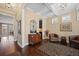 Inviting foyer with hardwood floors and decorative touches, leading to living areas at 213 Palmetto Walk Dr, Summerville, SC 29486