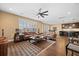 Spacious living room with hardwood floors and a large window at 213 Palmetto Walk Dr, Summerville, SC 29486