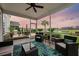 Relaxing screened-in porch overlooking a serene pond and lush landscaping at 213 Palmetto Walk Dr, Summerville, SC 29486