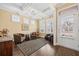 Comfortable sitting room with plantation shutters and neutral paint at 213 Palmetto Walk Dr, Summerville, SC 29486