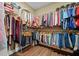 Well-organized walk-in closet with ample hanging space and shelving for efficient storage at 213 Palmetto Walk Dr, Summerville, SC 29486