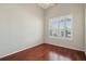 Bright bedroom with hardwood floors and natural light from the plantation shuttered window at 2176 Andover Way, Mount Pleasant, SC 29466
