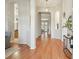 Elegant foyer with arched entryways, hardwood floors, and stylish decor, creating a grand entrance at 2176 Andover Way, Mount Pleasant, SC 29466