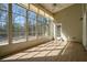 Bright sunroom with lots of natural light, featuring many windows and a ceiling fan at 2176 Andover Way, Mount Pleasant, SC 29466