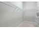 Walk-in closet with carpeted floors and multiple shelves and hanging racks offering ample storage space at 2176 Andover Way, Mount Pleasant, SC 29466