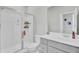 Bright bathroom featuring a glass shower enclosure, gray vanity and simple fixtures at 225 Bird Song Path, Summerville, SC 29485