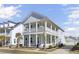 Beautiful two-story home featuring a spacious double porch, set in a well-maintained neighborhood at 225 Bird Song Path, Summerville, SC 29485