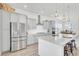 Bright and spacious kitchen with stainless steel appliances, a large island, and ample cabinet space at 225 Bird Song Path, Summerville, SC 29485