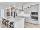 Modern kitchen featuring a spacious island, stainless steel appliances, and stylish pendant lighting at 225 Bird Song Path, Summerville, SC 29485
