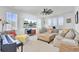 This is a comfortable living room with a large sectional sofa and a flat-screen TV at 225 Bird Song Path, Summerville, SC 29485