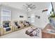 Well-lit movie room includes leather recliners, a large screen television and fun decor at 225 Bird Song Path, Summerville, SC 29485