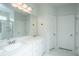 Bathroom featuring double sinks, modern fixtures, and a glass-enclosed shower at 2270 Kemmerlin St, Johns Island, SC 29455