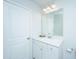 Simple bathroom with white vanity, sink, and chrome fixtures at 2270 Kemmerlin St, Johns Island, SC 29455