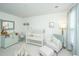 Bright Bedroom with crib, changing table, accent chair, and plush decorations at 2270 Kemmerlin St, Johns Island, SC 29455
