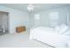 Bright bedroom featuring a white bed, a woven chest, and ample natural light at 2270 Kemmerlin St, Johns Island, SC 29455