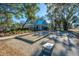 Bocce ball and cornhole area with pool in background for community enjoyment at 2270 Kemmerlin St, Johns Island, SC 29455