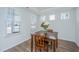 Bright dining room with a wooden table, perfect for Gathering meals at 2270 Kemmerlin St, Johns Island, SC 29455
