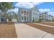 Beautiful two-story house featuring a double front porch and long driveway at 2270 Kemmerlin St, Johns Island, SC 29455