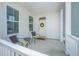 Inviting front porch with chairs and a wreath, creating a warm welcome at 2270 Kemmerlin St, Johns Island, SC 29455