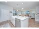 Spacious kitchen with island and open layout connected to the living room and dining area at 2270 Kemmerlin St, Johns Island, SC 29455
