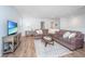 Cozy living room with a comfortable couch, stylish coffee table, and hardwood floors at 2270 Kemmerlin St, Johns Island, SC 29455