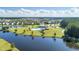 Expansive community view featuring a pool, playground, lake, and numerous homes at 232 Decatur Dr, Summerville, SC 29486