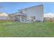 Backyard featuring a screened-in porch, grill, patio, and a lawn at 232 Decatur Dr, Summerville, SC 29486