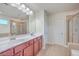 Bright bathroom featuring a double sink vanity and walk-in shower at 232 Decatur Dr, Summerville, SC 29486