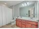 Bathroom featuring a dual sink vanity, tiled floors, and a shower with white curtain at 232 Decatur Dr, Summerville, SC 29486