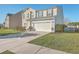 Charming two-story home featuring an attached two-car garage and well-maintained landscaping in a suburban neighborhood at 232 Decatur Dr, Summerville, SC 29486