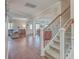 Interior view of the staircase and open floor plan layout in the living room, kitchen, and dining area at 232 Decatur Dr, Summerville, SC 29486