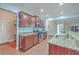Kitchen boasts granite counters, stainless appliances, and ample wood cabinet space at 232 Decatur Dr, Summerville, SC 29486