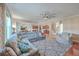 Open-concept living area with a plush sofa, fan, and seamless flow to the kitchen at 232 Decatur Dr, Summerville, SC 29486