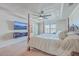 Bedroom boasting a tray ceiling, four-poster bed, and a mounted flatscreen television at 232 Decatur Dr, Summerville, SC 29486