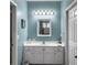 Comfortable bathroom featuring a bright vanity and a mirrored medicine cabinet at 2419 Tuscany Dr, North Charleston, SC 29406