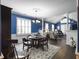 Open concept: Dining room flows into a large living area, with blue accent walls at 2419 Tuscany Dr, North Charleston, SC 29406