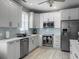 Well-designed kitchen featuring modern stainless steel appliances and white cabinets at 2419 Tuscany Dr, North Charleston, SC 29406