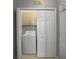 Compact laundry room with washer and dryer hookups, and storage space at 2419 Tuscany Dr, North Charleston, SC 29406